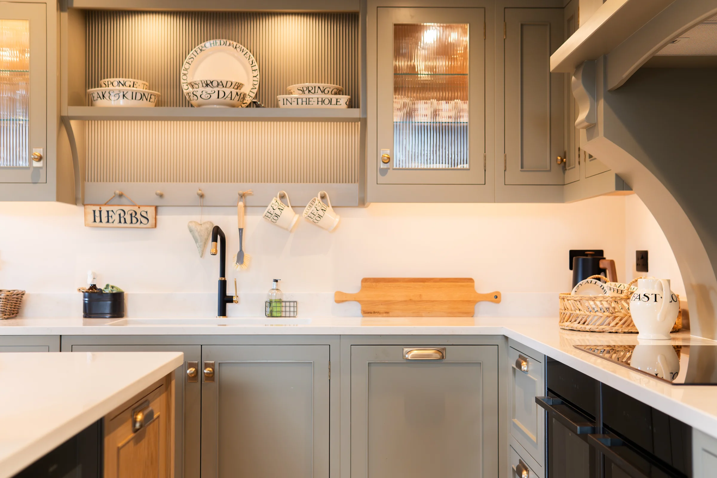 Utility corner wide grey shaker reeded glass cabinet plates herbs sign black tap oak board