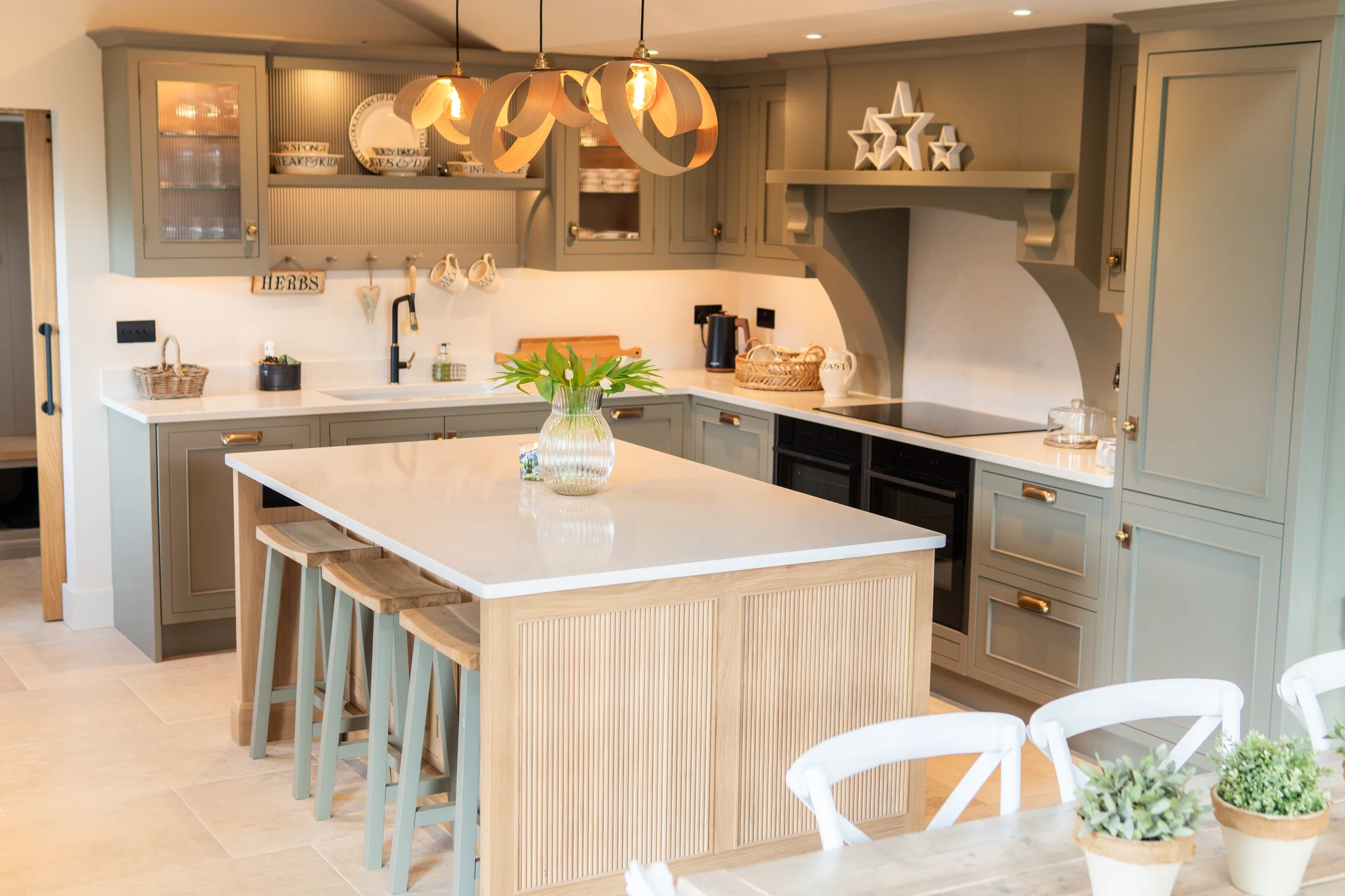 Wide kitchen alt oak reeded island stools ribbon pendants grey shaker arched recess
