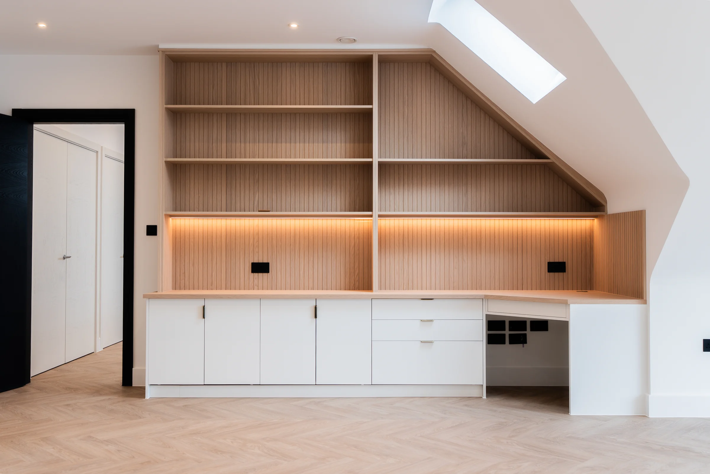 White desk unit oak slat shelves alt angle skylight herringbone floor