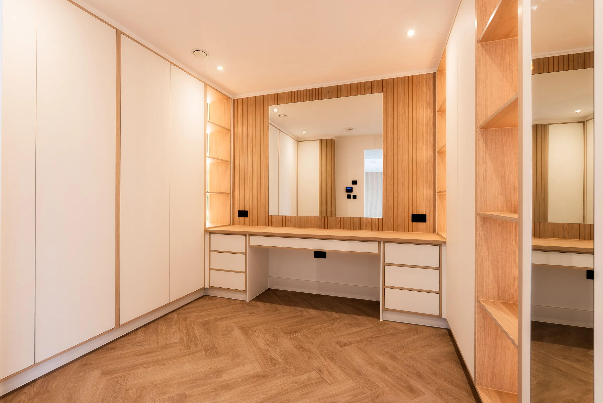White dressing room vanity large mirror oak slat wall lit shelves wardrobes