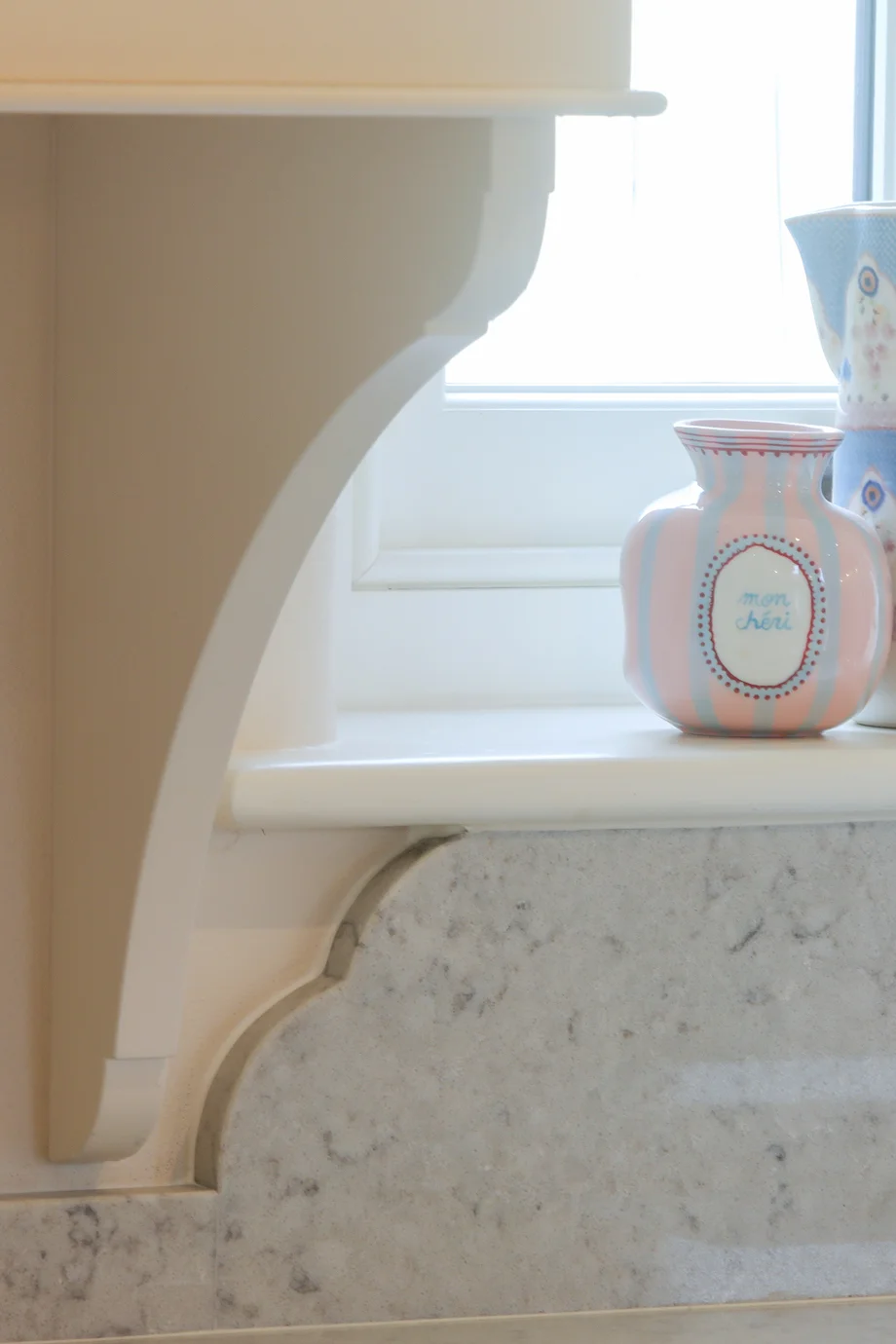 Corbel bracket detail wall cabinet marble upstand windowsill ceramics