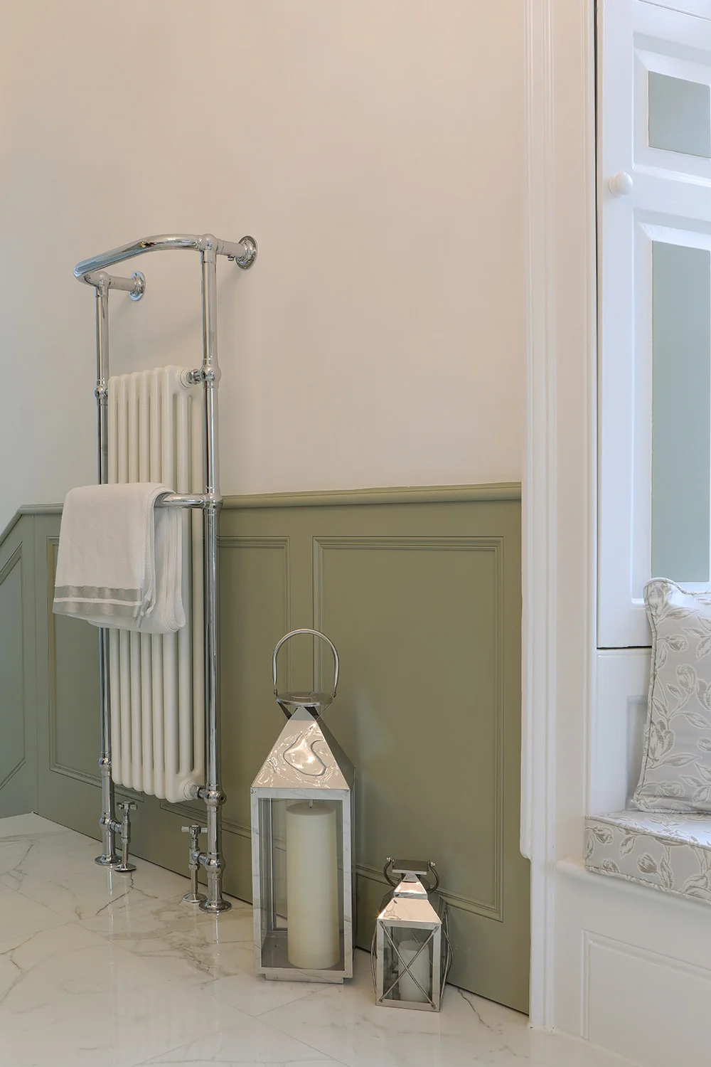 Towel rail sage panelling corner candle lanterns frosted glass door