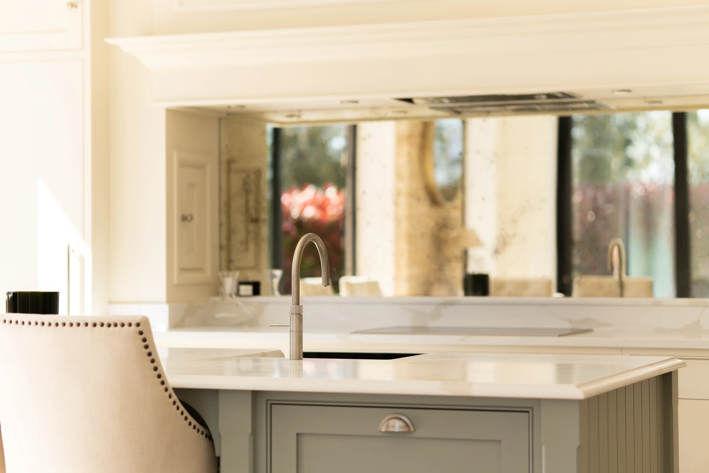 Sage island undermount sink nickel gooseneck tap quartz antiqued mirror studded chair