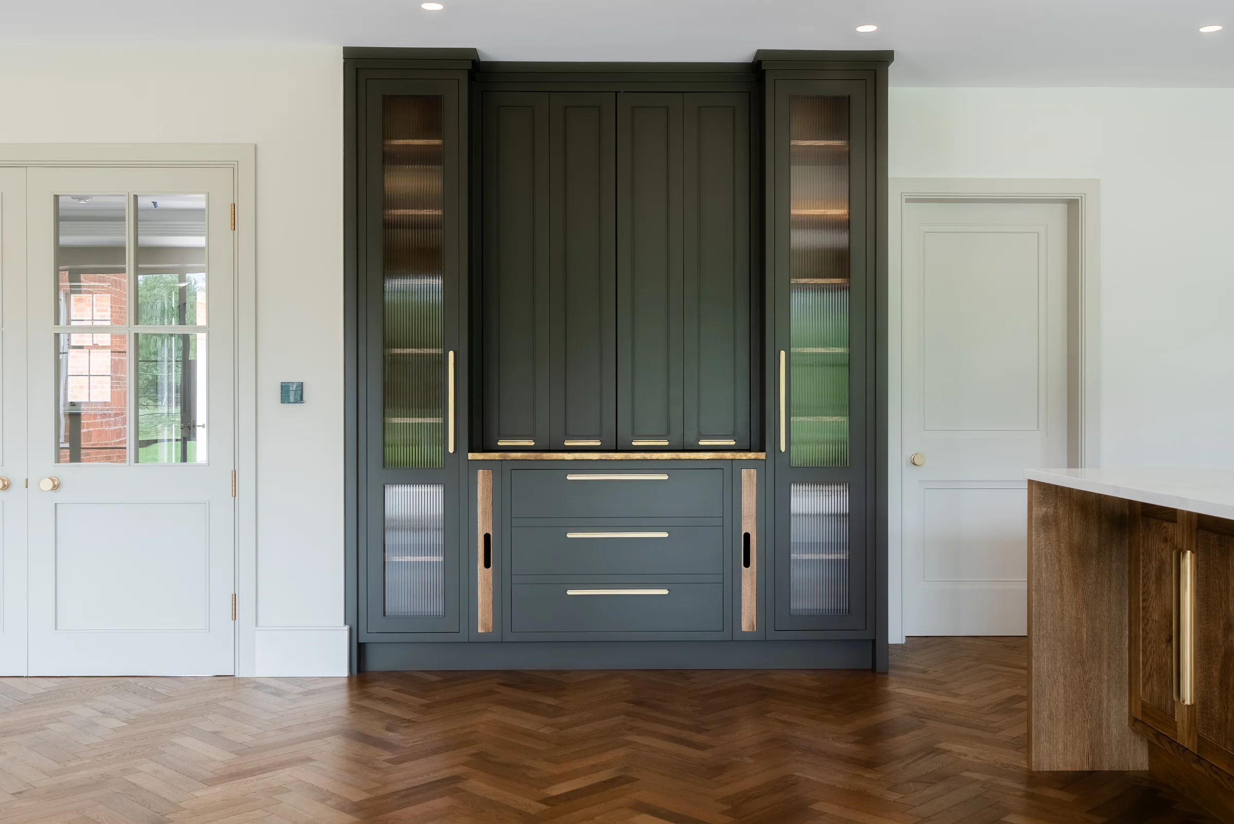 Dark charcoal dresser front on reeded glass doors drawers oak ledge brass handles