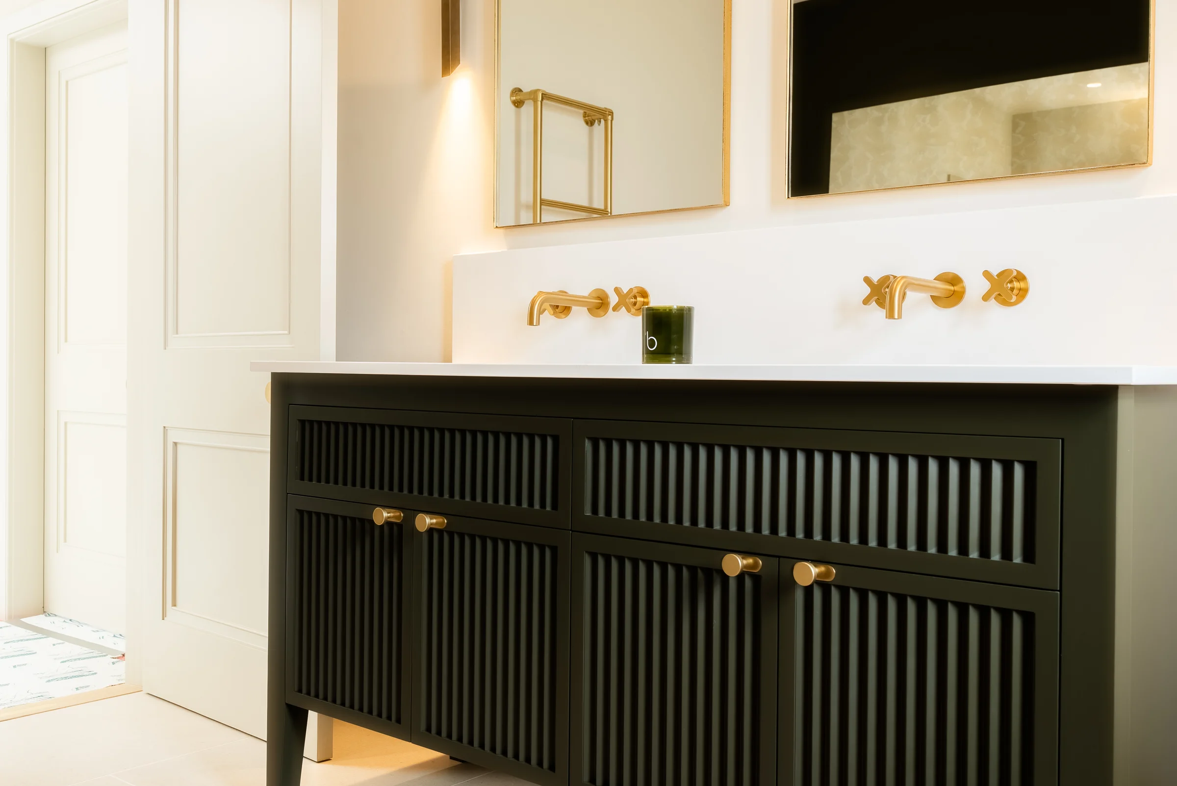 Dark green reeded double vanity brass knobs taps mirrors candle