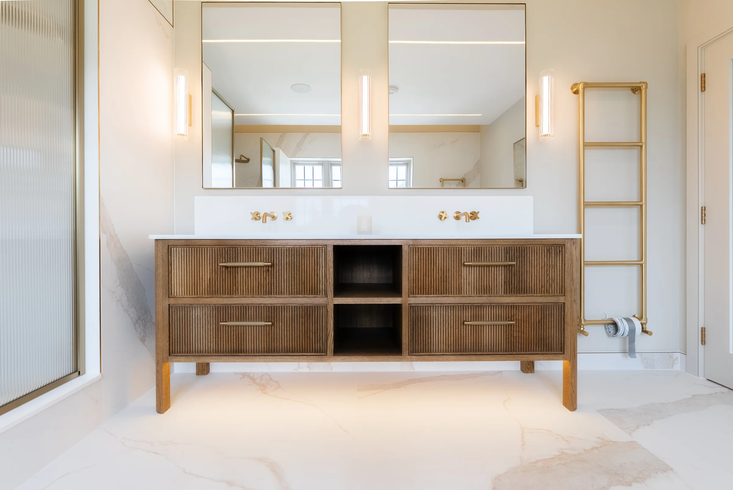 Vanity front on dark oak reeded double vanity brass handles cubby mirrors lights marble