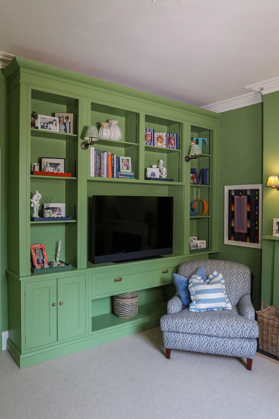 Green media unit full view tv recess adjustable shelves cupboards cornice detail