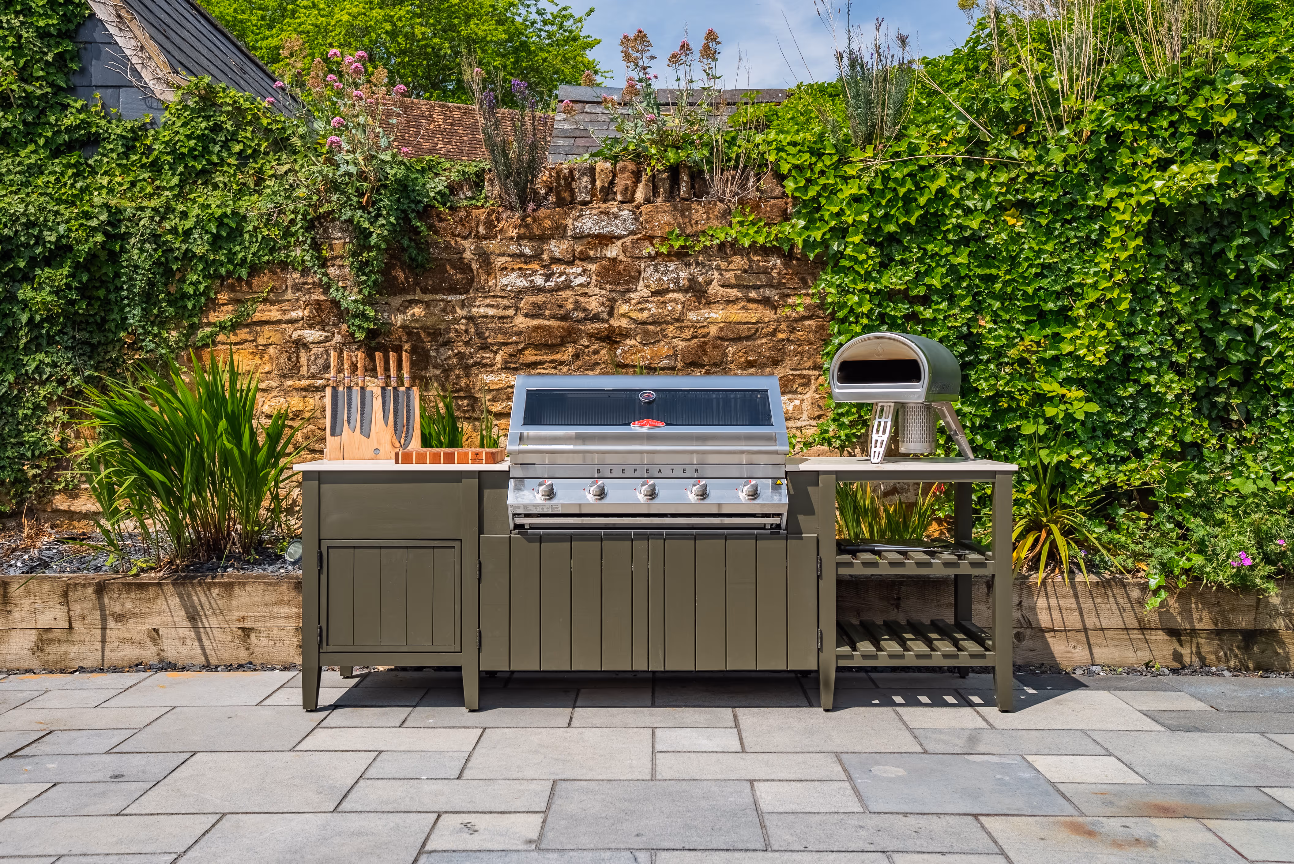 Alfresco one full kitchen stone wall greenery